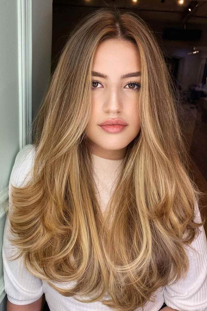 Mid-Back Honey Blonde Balayage With Curtain Bangs, Wavy Mid-Back Honey Blonde Balayage With Curtain Bangs, Wavy — Classy Haircuts for Long Hair