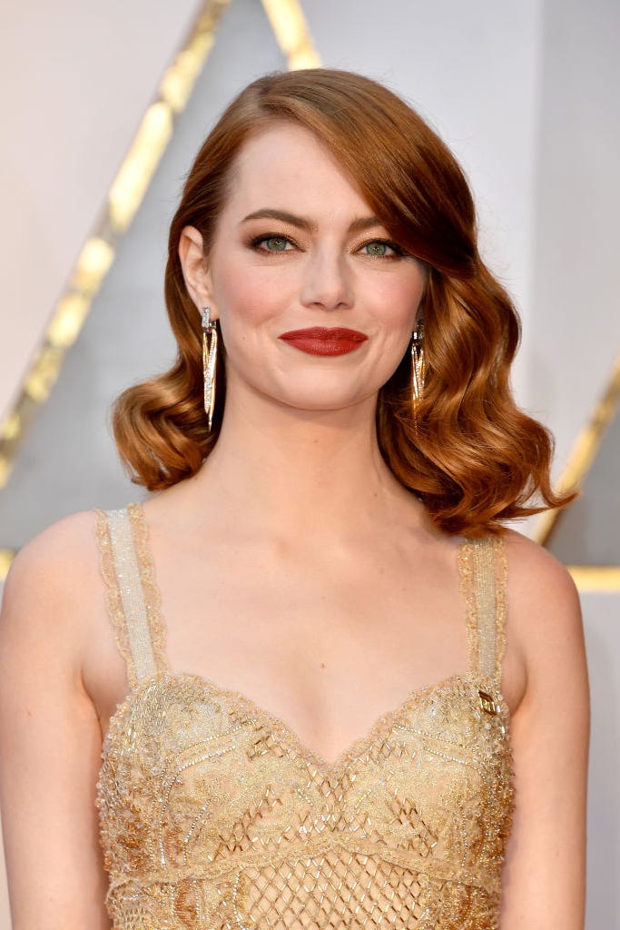 Chin Length Wavy Bob With Auburn Hue And Side Bangs — Classy Haircuts for Round Face