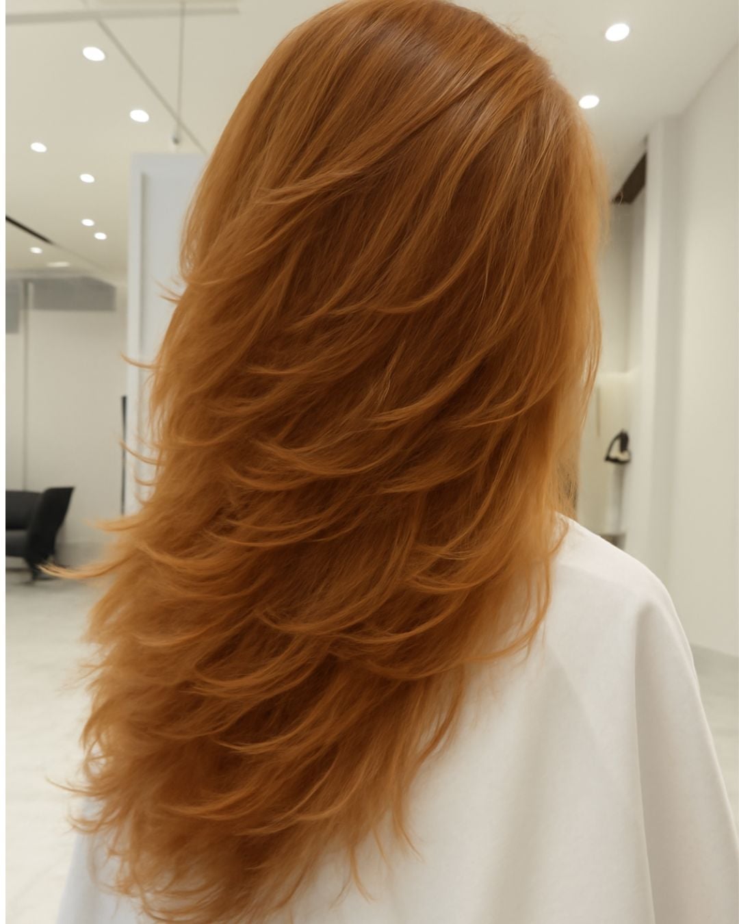 Mid-Back Stacked Layers — Classy Haircuts for Thick Hair