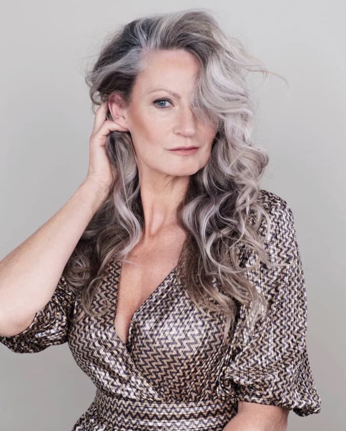 Mid-Back Wavy Grey With Blonde Highlights — Classy Haircuts for Women over 60