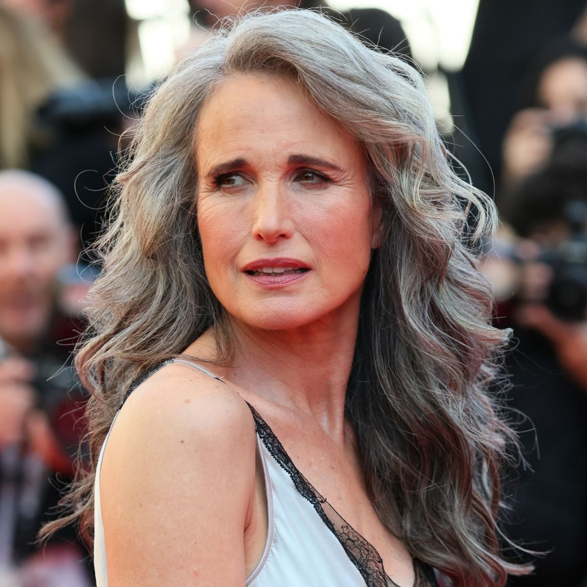 Thick Wavy Mid-Back With Subtle Highlights — Classy Haircuts for Women over 60
