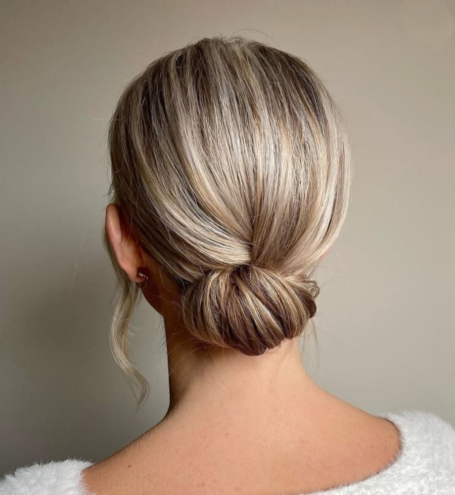 Classy Low Bun With Wispy Bangs Classy Low Bun With Wispy Bangs — Classy Hairstyles for Thinning Hair