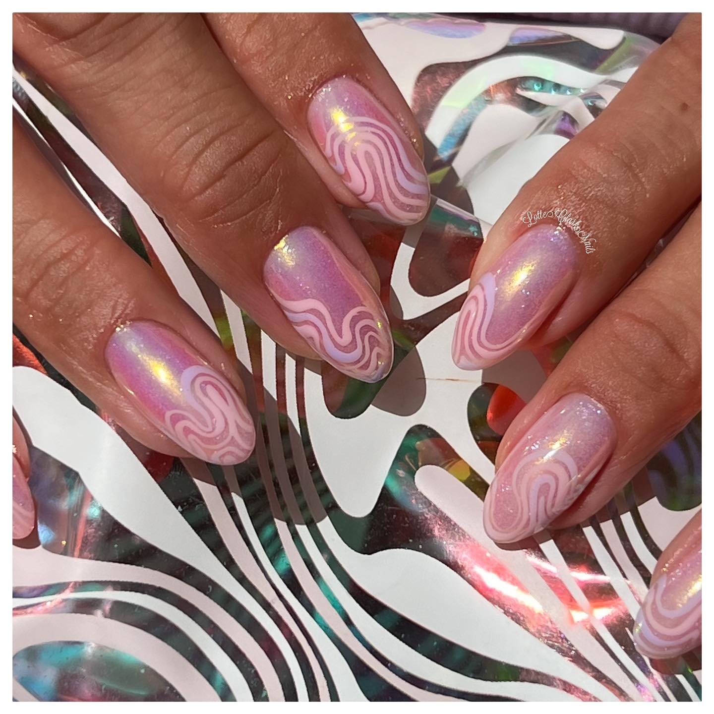 Medium Oval Pale Pink Holographic Wavy Line Nails Medium Oval Pale Pink Holographic Wavy Line Nails — Classy Holographic Nails