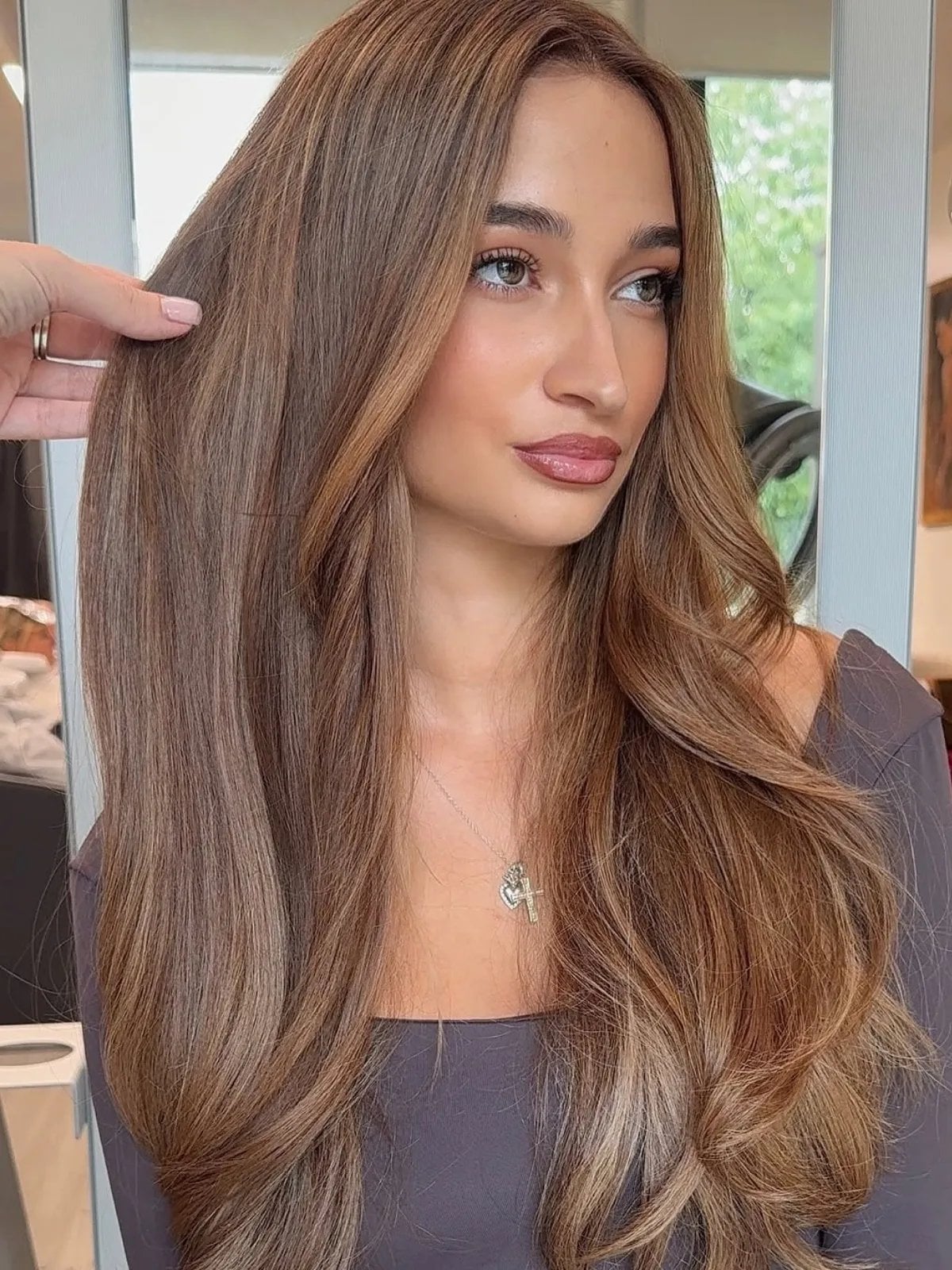 Mid-Back Layers With Glossy Honey Highlights and Curtain Bangs — Classy Honey Brown Highlights