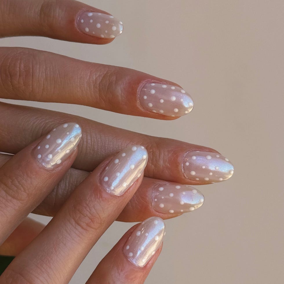 Sheer Nude Pearlescent White Dot Medium Oval Nails, Close-Up Take Sheer Nude Pearlescent White Dot Medium Oval Nails, Close-Up Take — Classy Iridescent Nails