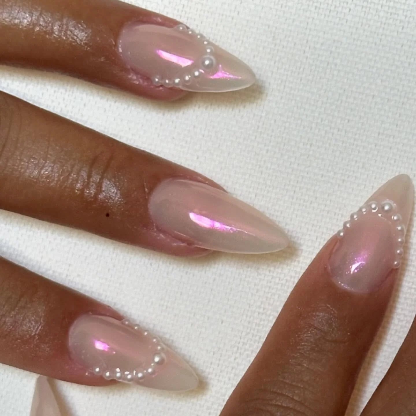 Pale Pink Iridescent Almond Nails with Pearl Accents Pale Pink Iridescent Almond Nails with Pearl Accents — Classy Iridescent Nails