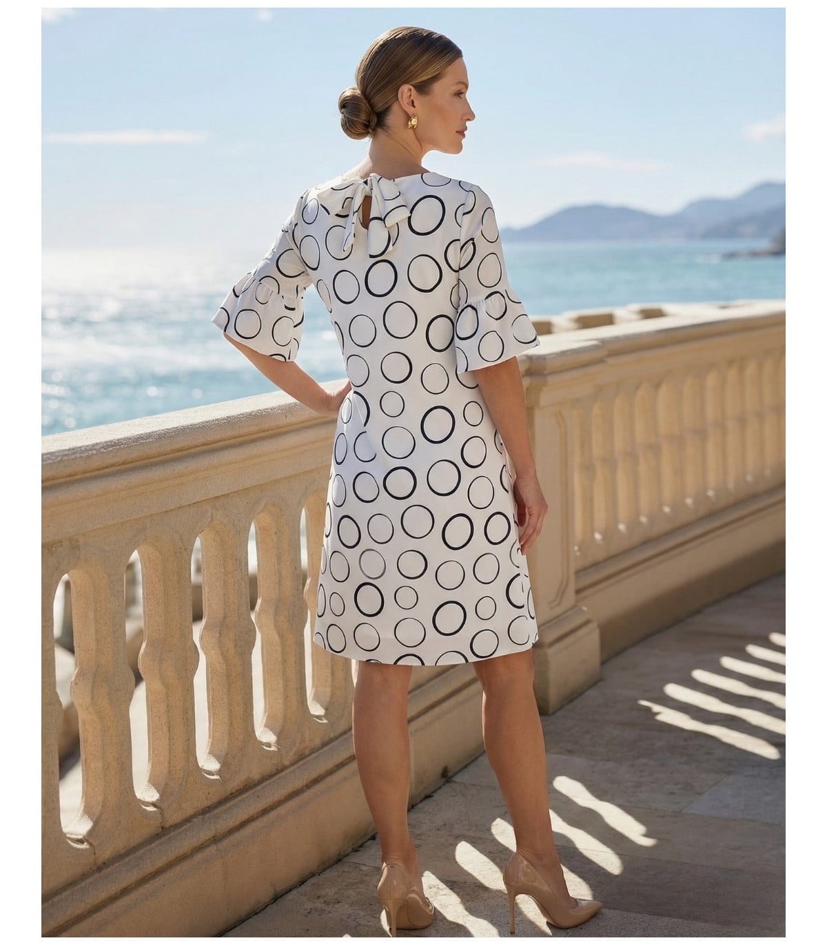 White Midi Dress with Black Circle Print White Midi Dress with Black Circle Print — Classy Knee Length Dress