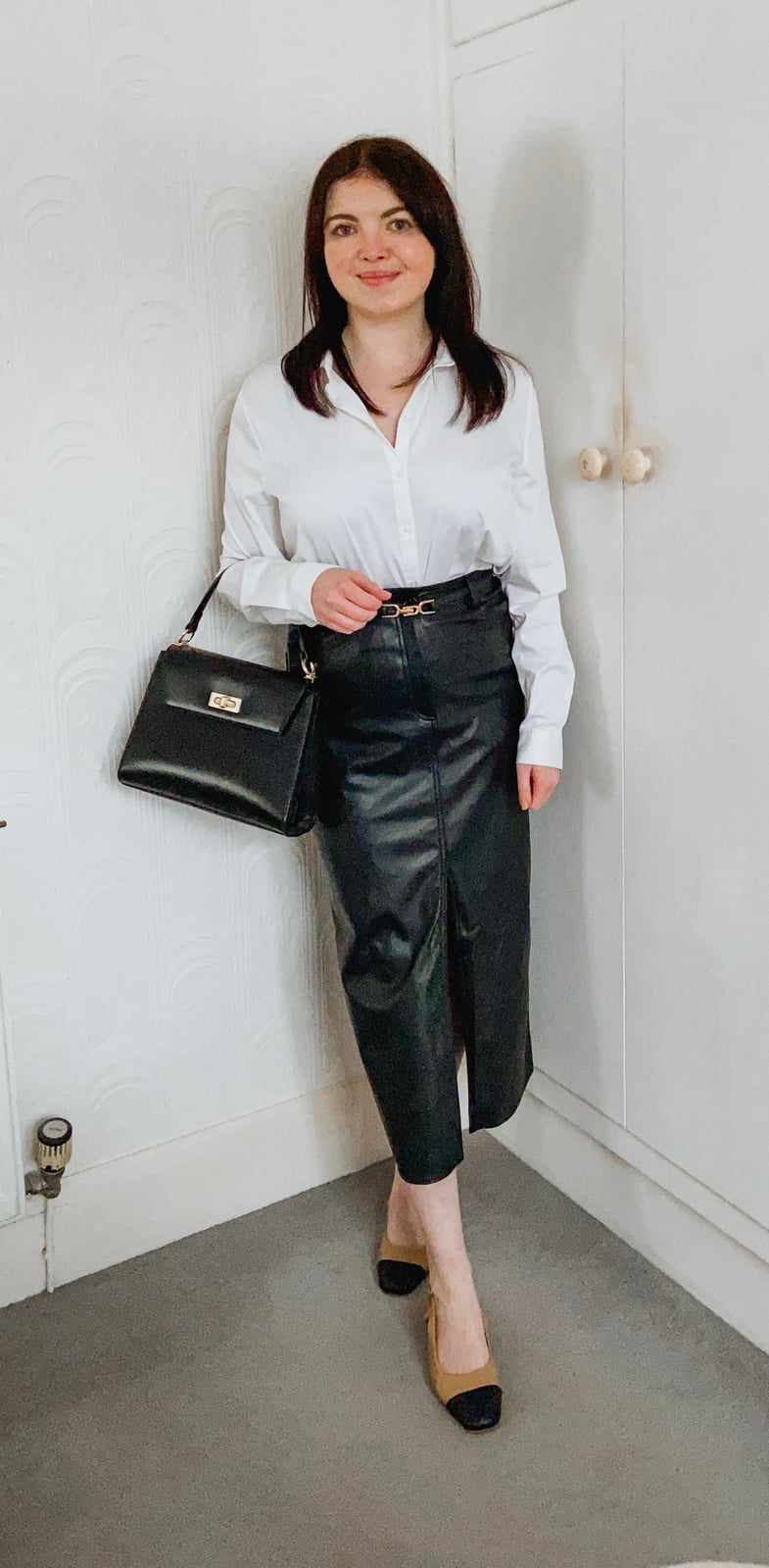 Black Leather Midi Skirt With Button Detail Black Leather Midi Skirt With Button Detail — Classy Leather Skirt Outfits