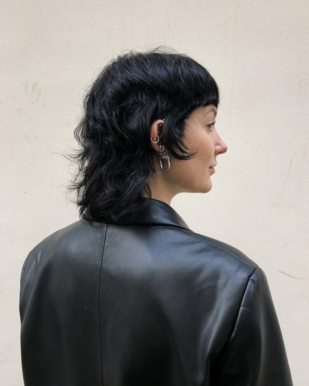 Black Wavy Shag With Micro Bangs Black Wavy Shag With Micro Bangs — Classy Lesbian Haircuts