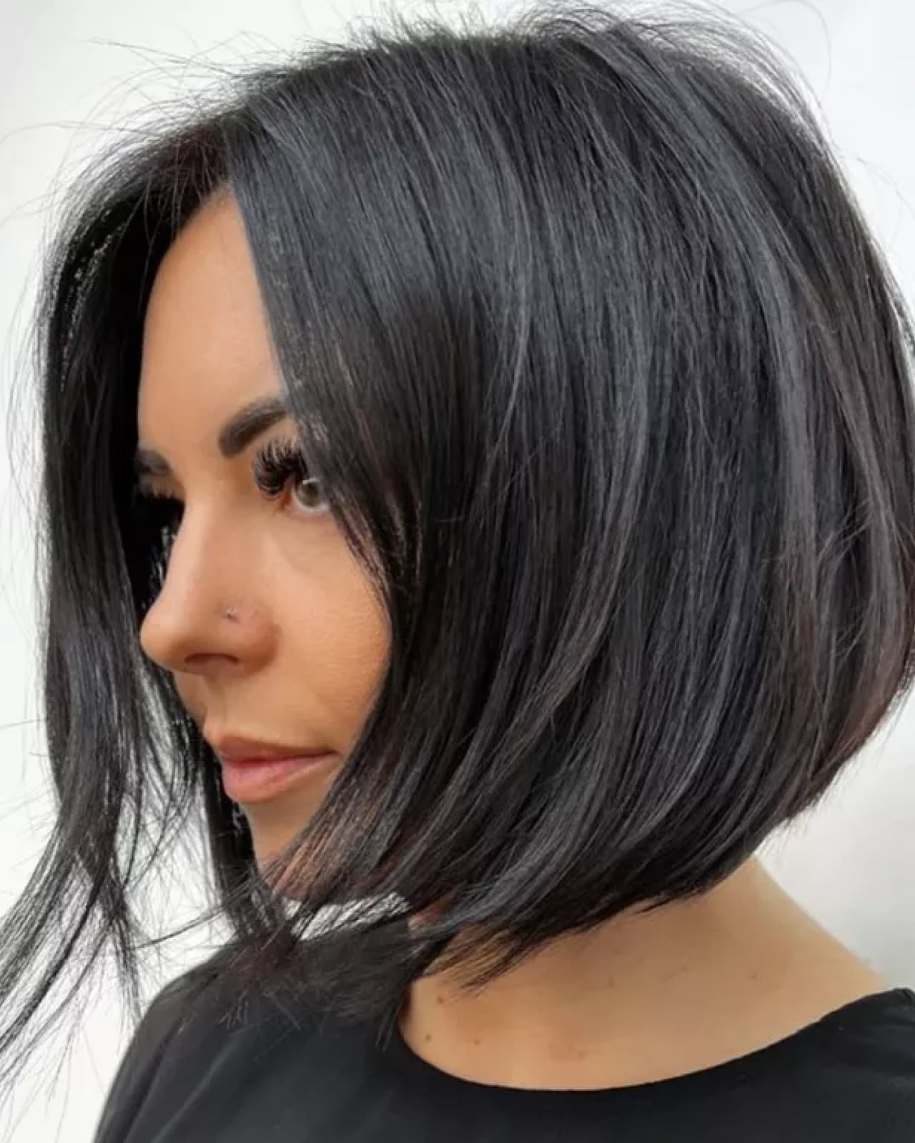 Thick Wavy Dark Brown Bob With Subtle Grey Tones Thick Wavy Dark Brown Bob With Subtle Grey Tones — Classy Lesbian Haircuts