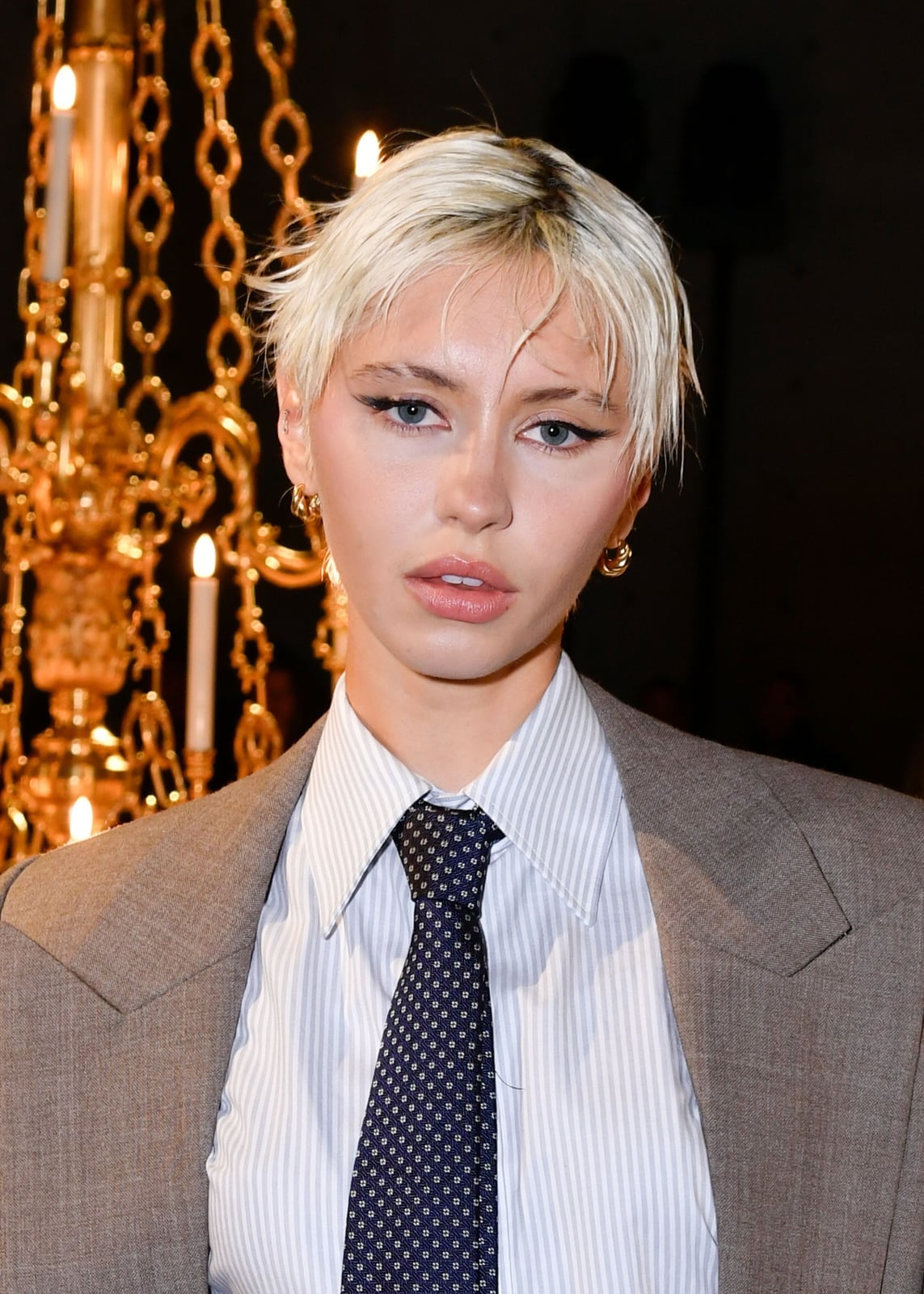 Platinum Blonde Textured Pixie With Short Fringe Platinum Blonde Textured Pixie With Short Fringe — Classy Lesbian Haircuts