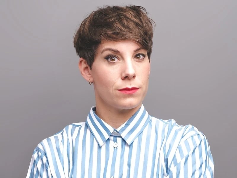 Wavy Fine Dark Brown Pixie With Side-Swept Bangs Wavy Fine Dark Brown Pixie With Side-Swept Bangs — Classy Lesbian Haircuts