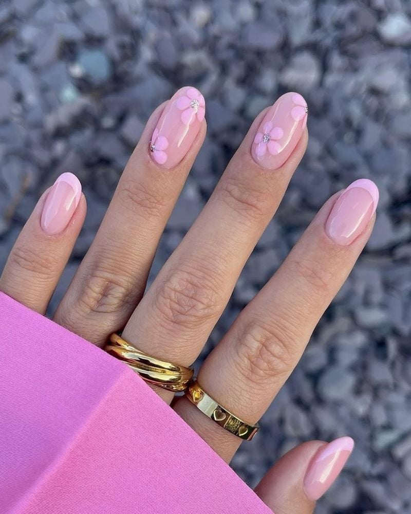 Medium Oval Pink French With Floral Rhinestone Accents Medium Oval Pink French With Floral Rhinestone Accents — Classy Looks Nail