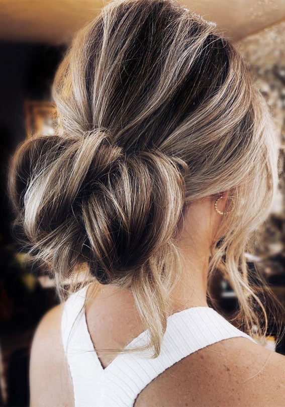 Dark Brown Sleek Low Bun With Soft Waves Dark Brown Sleek Low Bun With Soft Waves — Classy Loose Updo