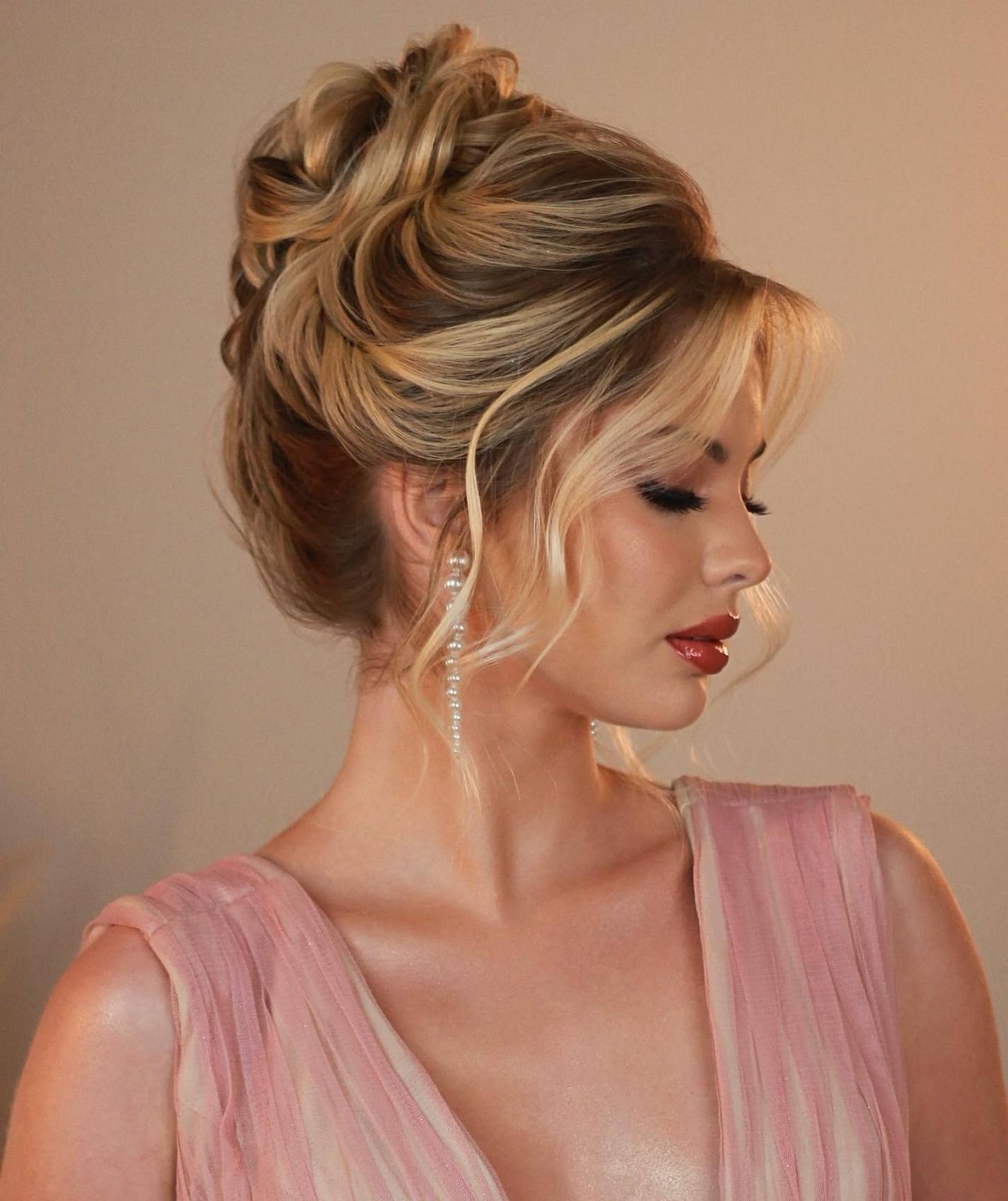 Blonde Voluminous Updo With Wispy Bangs, Mid-Back Blonde Voluminous Updo With Wispy Bangs, Mid-Back — Classy Loose Updo