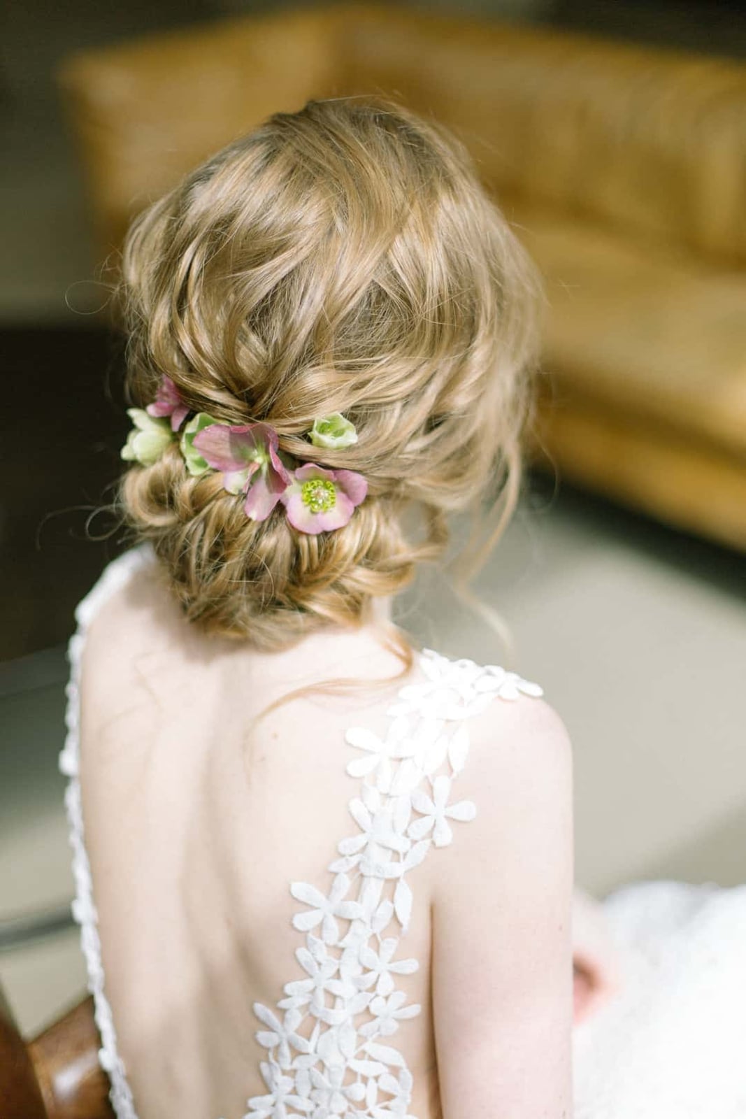 Honey Blonde Messy Low Bun With Tendrils, Collarbone Honey Blonde Messy Low Bun With Tendrils, Collarbone — Classy Low Bun Wedding Hair