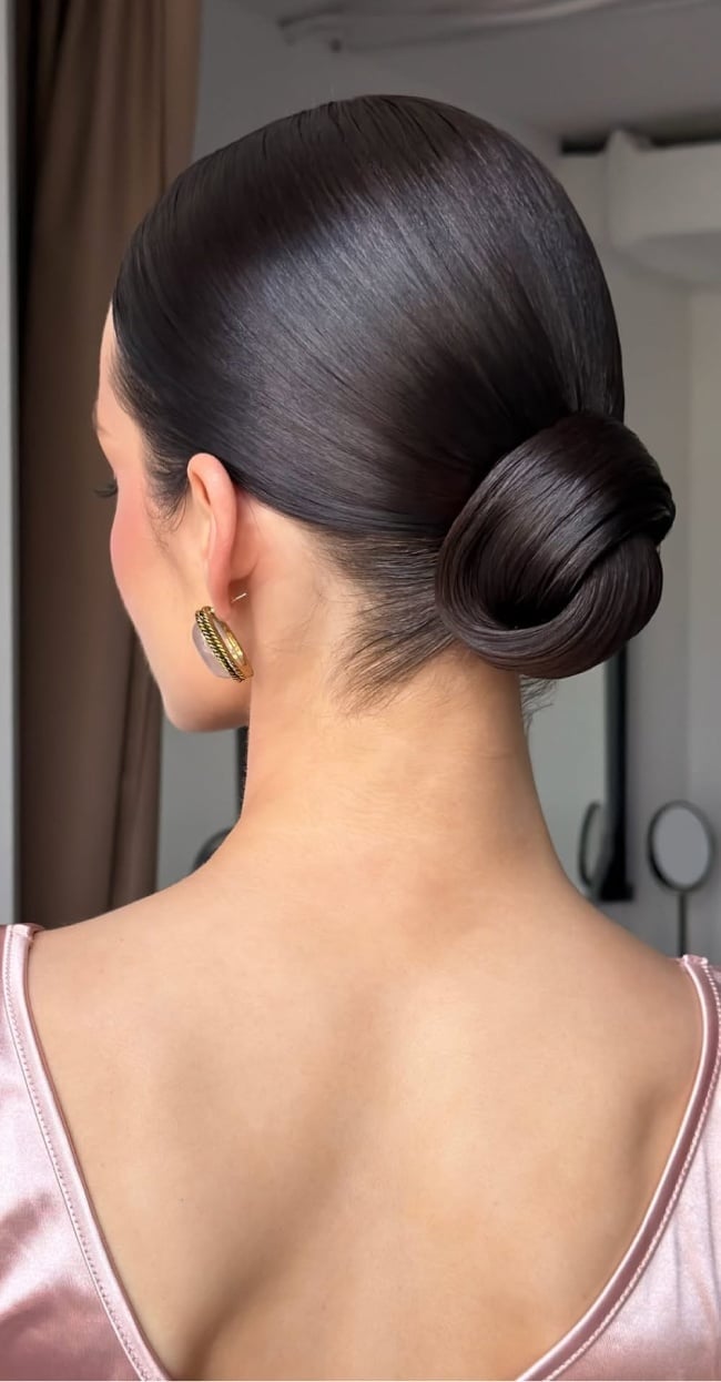 Sleek Dark Brown Low Bun Sleek Dark Brown Low Bun — Classy Low Bun Wedding Hair