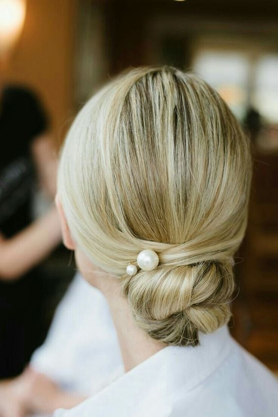 Ash Blonde Sleek Low Bun With Pearl Pin Ash Blonde Sleek Low Bun With Pearl Pin — Classy Low Bun Wedding Hair
