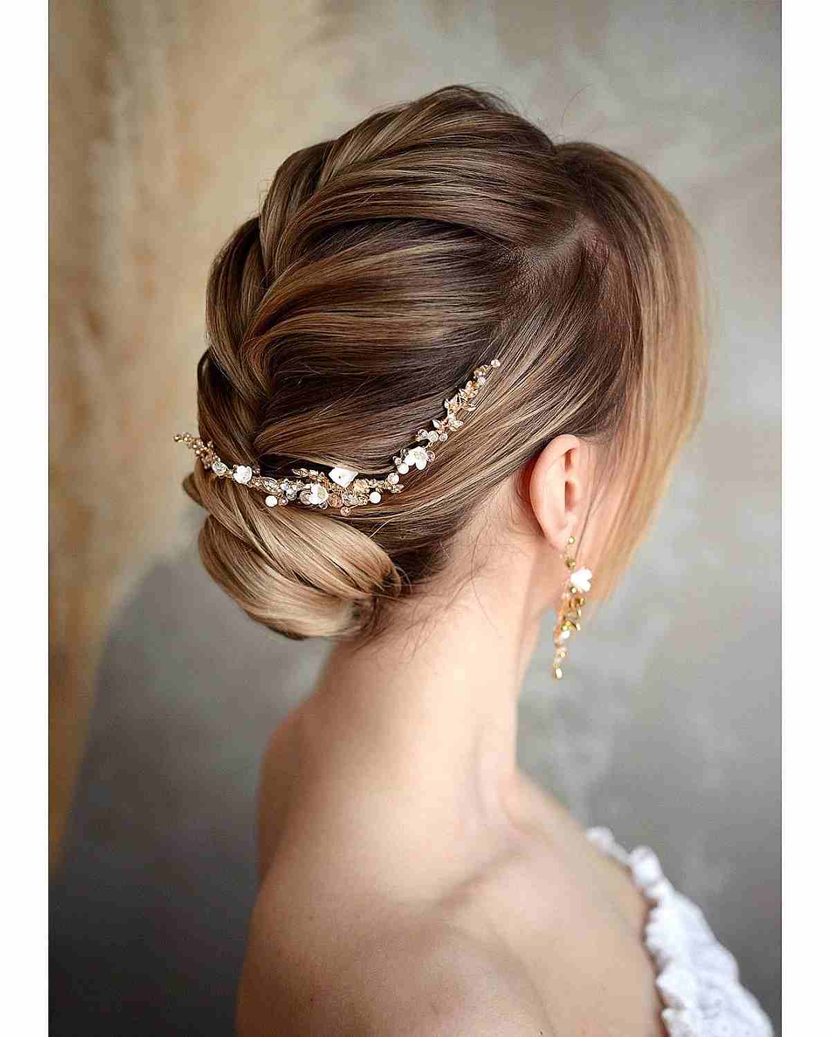 Ash Blonde Low Bun With Flowers Ash Blonde Low Bun With Flowers — Classy Low Bun Wedding Hair