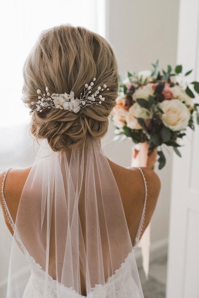 Light Blonde Textured Low Updo With Veil Light Blonde Textured Low Updo With Veil — Classy Low Bun Wedding Hair