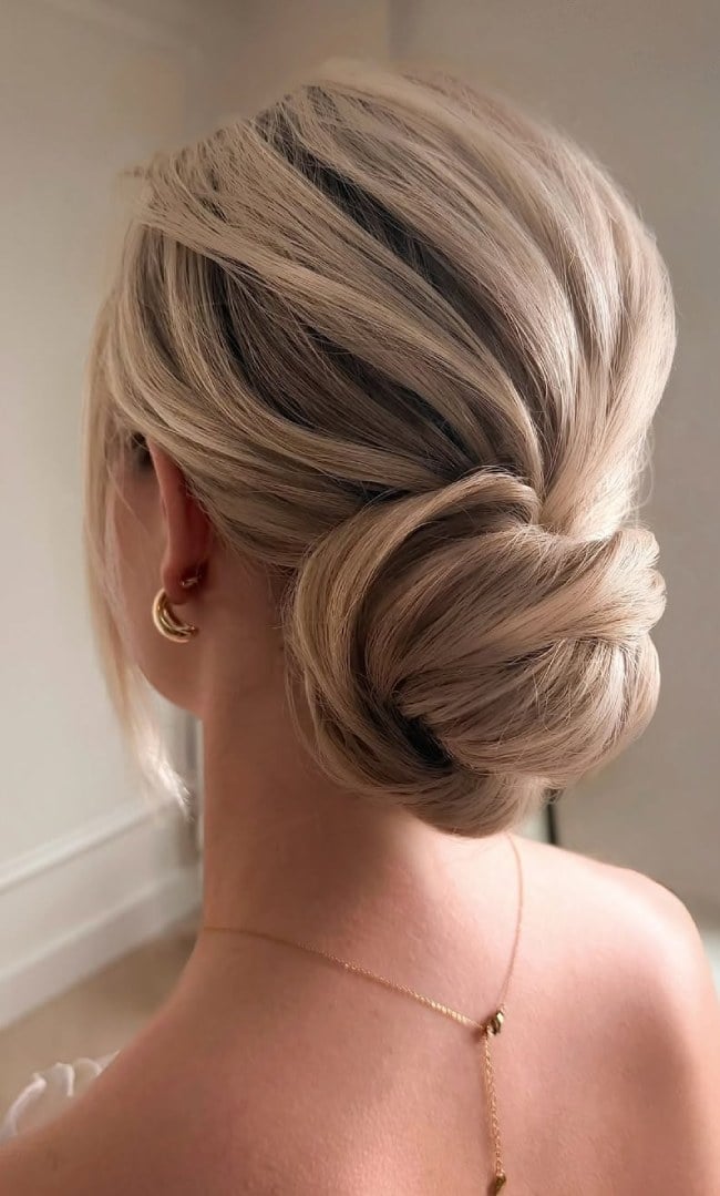 Fine Wavy Beige Blonde Twisted Low Bun Fine Wavy Beige Blonde Twisted Low Bun — Classy Low Bun Wedding Hair