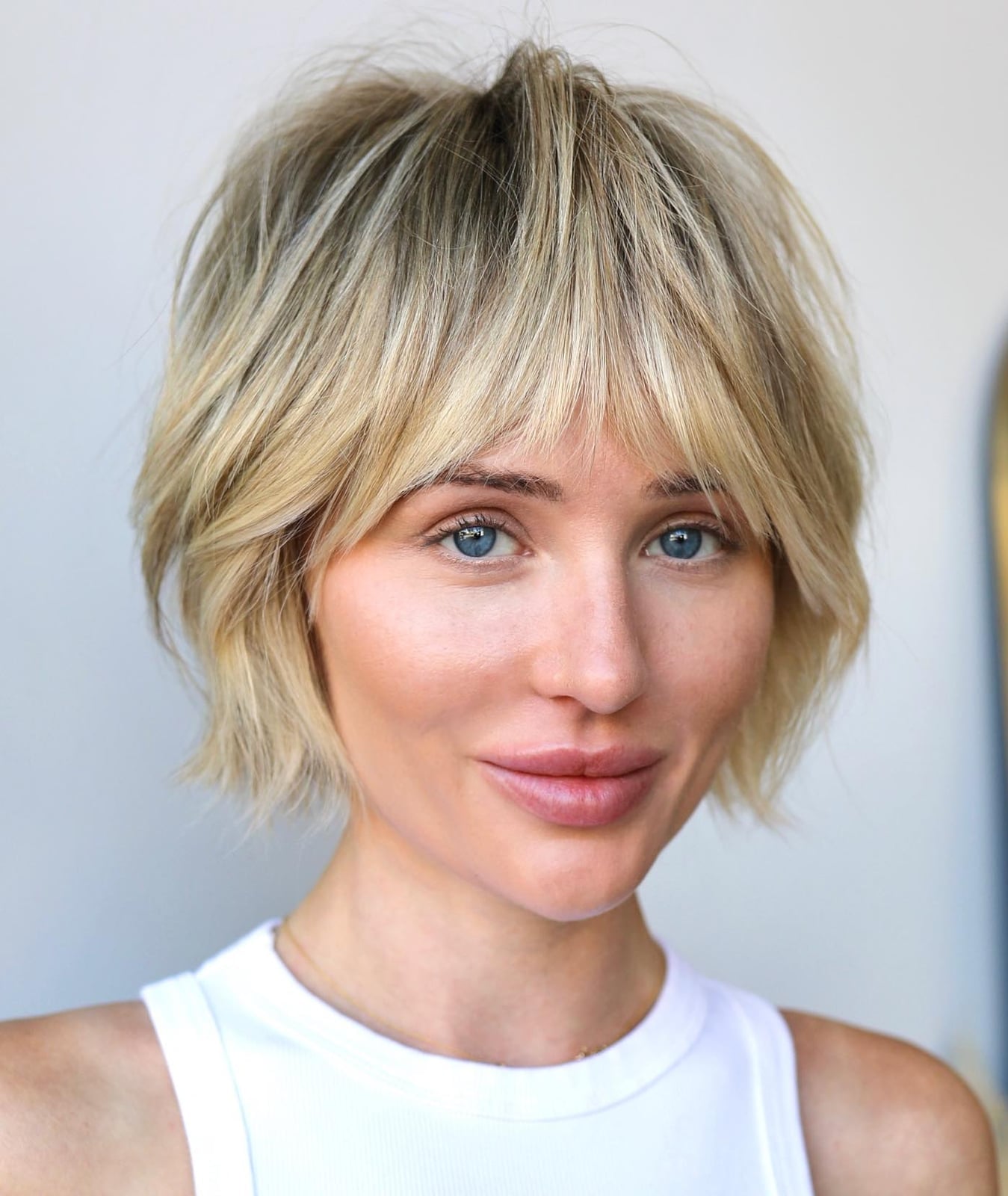 Textured Ash Blonde Shag With Curtain Bangs — Classy Low Maintenance Haircuts