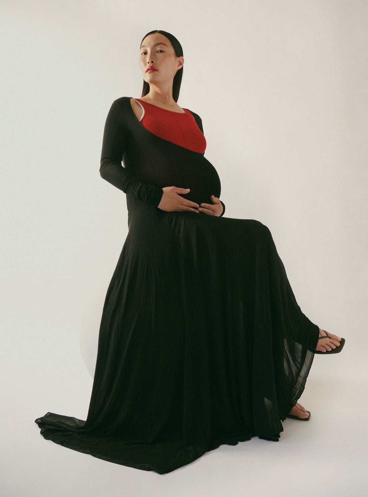 Black Long Sleeve Dress with Red Inner Top Black Long Sleeve Dress with Red Inner Top — Classy Maternity Photoshoot Outfits