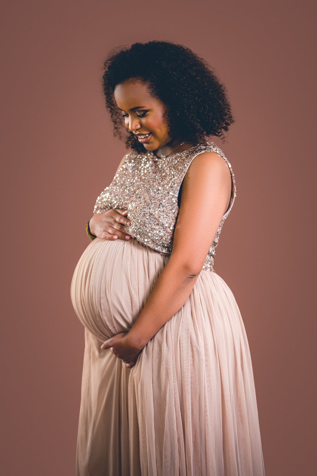 Silver Sequined Top with Beige Tulle Skirt Silver Sequined Top with Beige Tulle Skirt — Classy Maternity Photoshoot Outfits