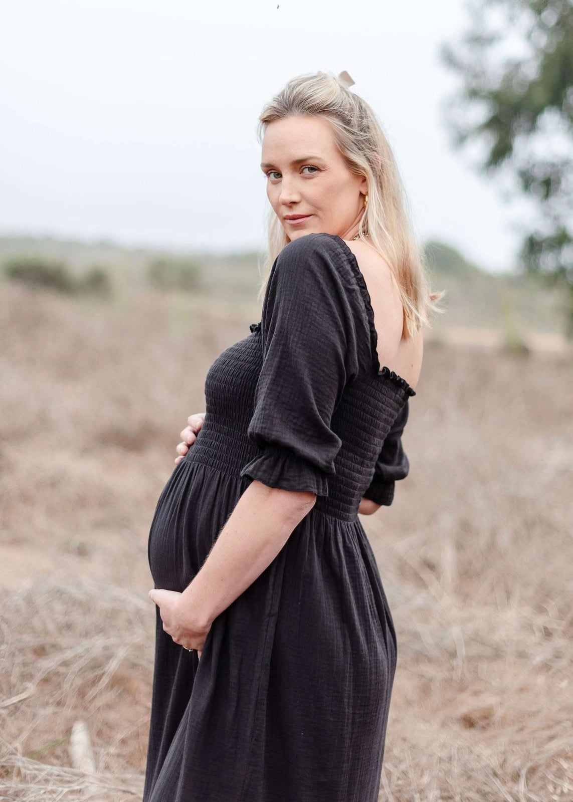 Black Smocked Bodice Midi Dress Black Smocked Bodice Midi Dress — Classy Maternity Photoshoot Outfits
