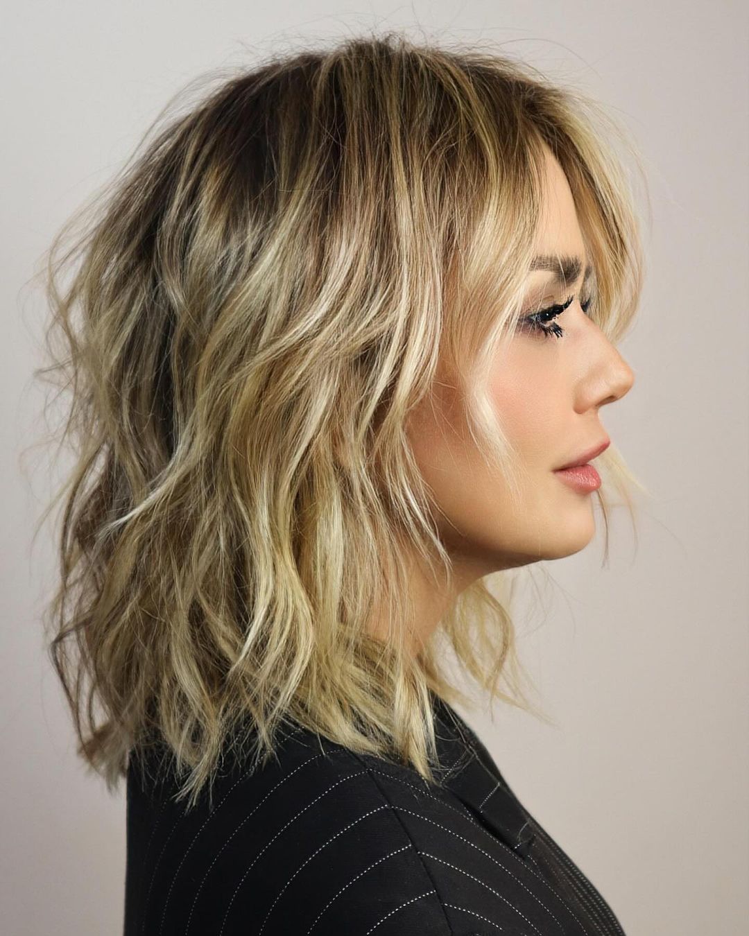 Ash Blonde Collarbone Layers With Textured Waves Ash Blonde Collarbone Layers With Textured Waves — Classy Mid Length Hair