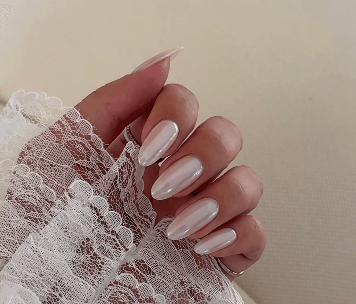 Milky Nude High-Shine Chrome Medium Almond Nails Milky Nude High-Shine Chrome Medium Almond Nails — Classy Nude Chrome Nails