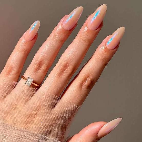 Nude Iridescent Blue Pink Shift Long Stiletto Nails Nude Iridescent Blue Pink Shift Long Stiletto Nails — Classy Nude Chrome Nails
