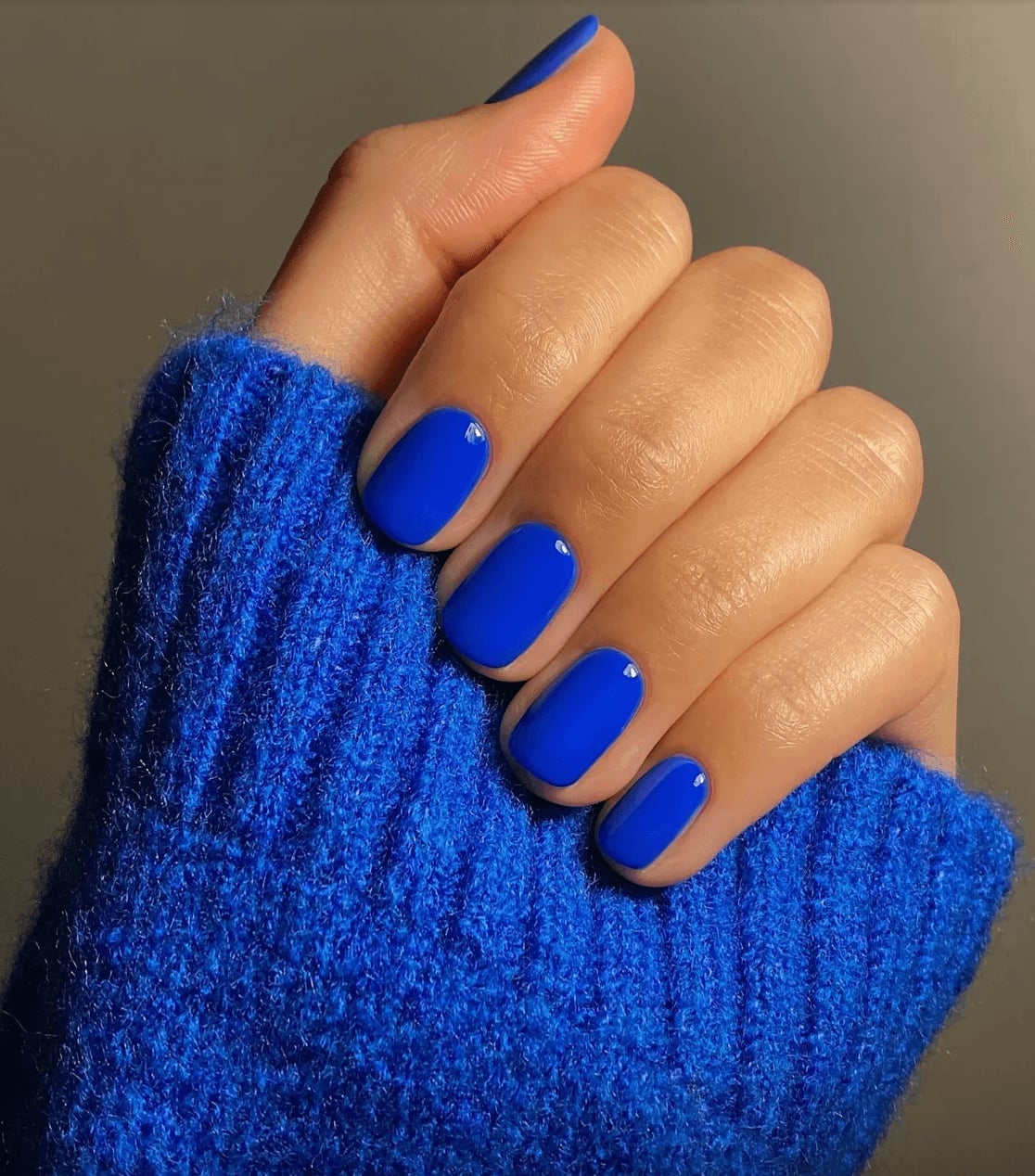Glossy Vibrant Cobalt Blue Short Square Nails, Close-Up Take Glossy Vibrant Cobalt Blue Short Square Nails, Close-Up Take — Classy One Color Nails