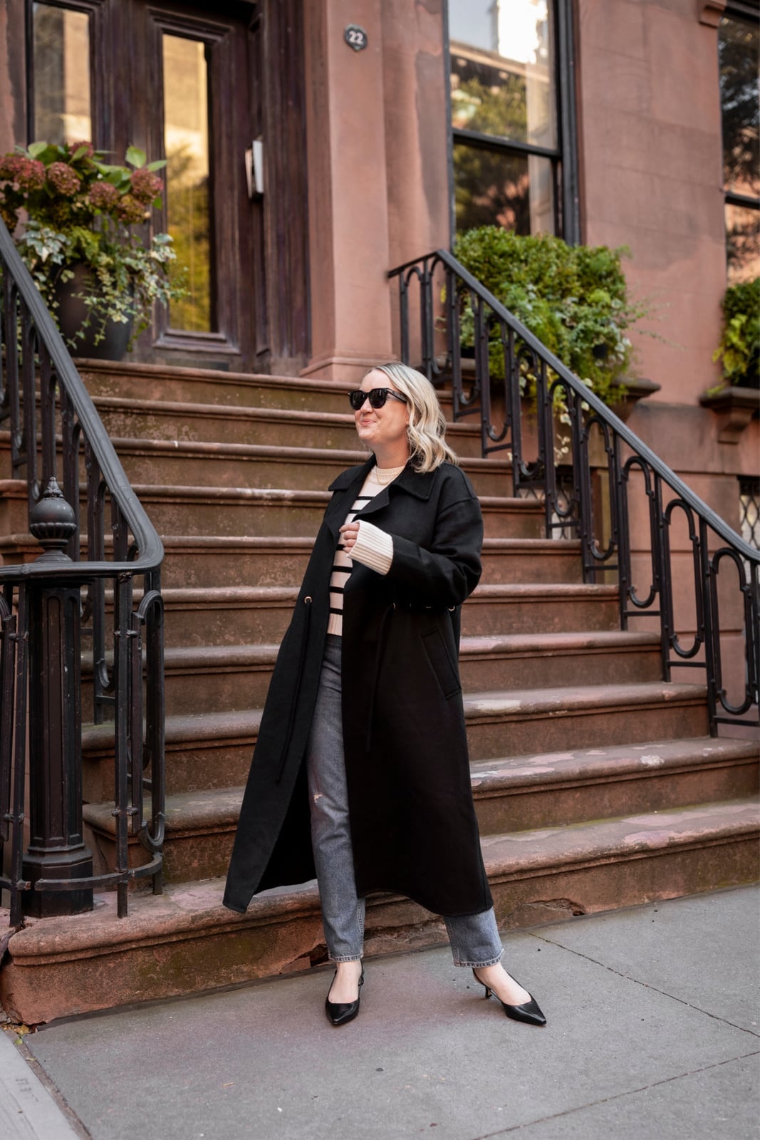 Longline Black Coat Over Striped Knit and Jeans Longline Black Coat Over Striped Knit and Jeans — Classy Outdoor Outfit