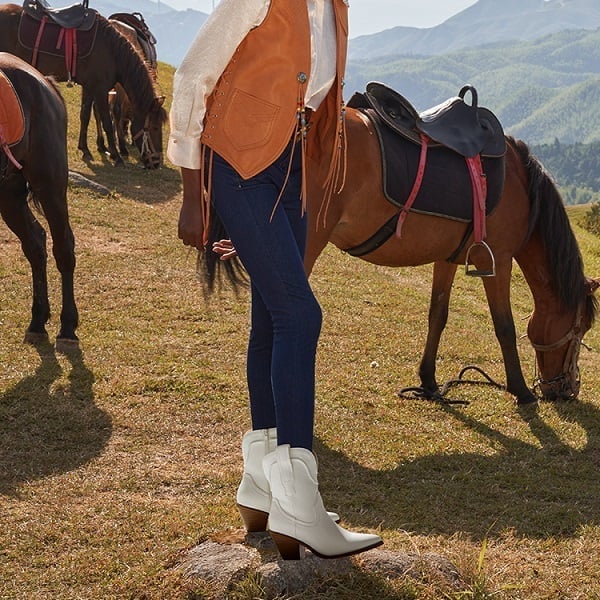 Fringe Vest and Jeans with White Cowboy Boots Fringe Vest and Jeans with White Cowboy Boots — Classy Outfits with Cowboy Boots