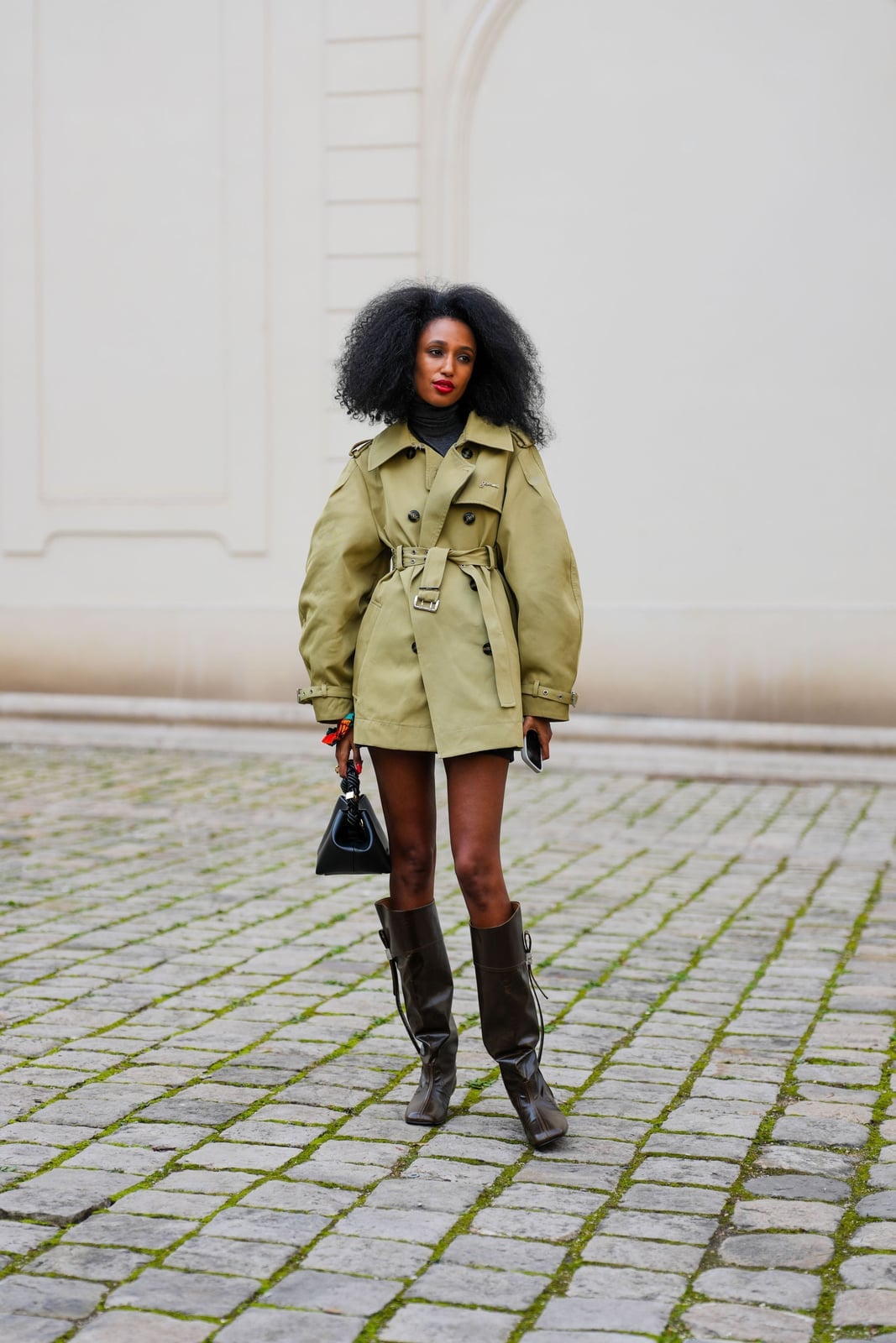 Khaki Trench Coat with Black Turtleneck and Knee-High Cowboy Boots Khaki Trench Coat with Black Turtleneck and Knee-High Cowboy Boots — Classy Outfits with Cowboy Boots