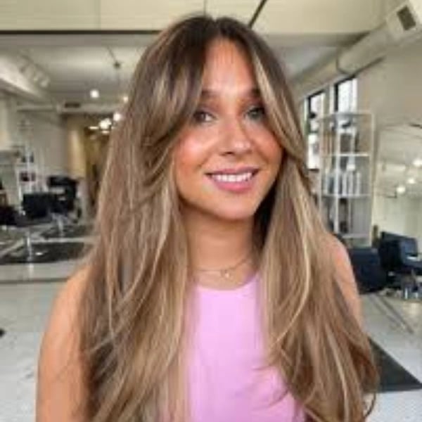 Mid-Back Layers With Curtain Bangs Mid-Back Layers With Curtain Bangs — Classy Oval Face Haircuts