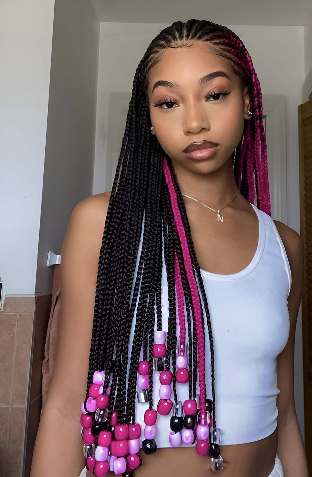 Black Box Braids With Pink Highlights and Beads Black Box Braids With Pink Highlights and Beads — Classy Peekaboo Braids