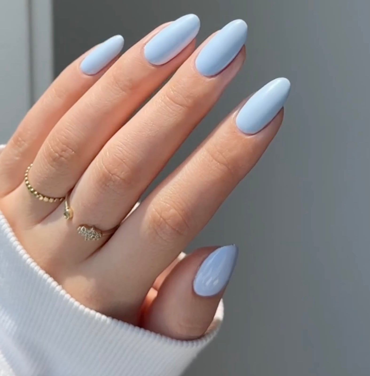 Glossy Solid Light Periwinkle Almond Nails, Close-Up Take — Classy Periwinkle Nails