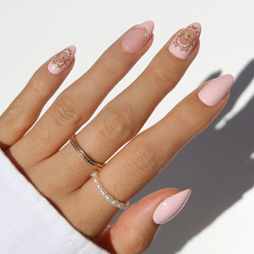 Opaque Pink With Gold Emblem Art Medium Almond Nails — Classy Pink Almond Nails