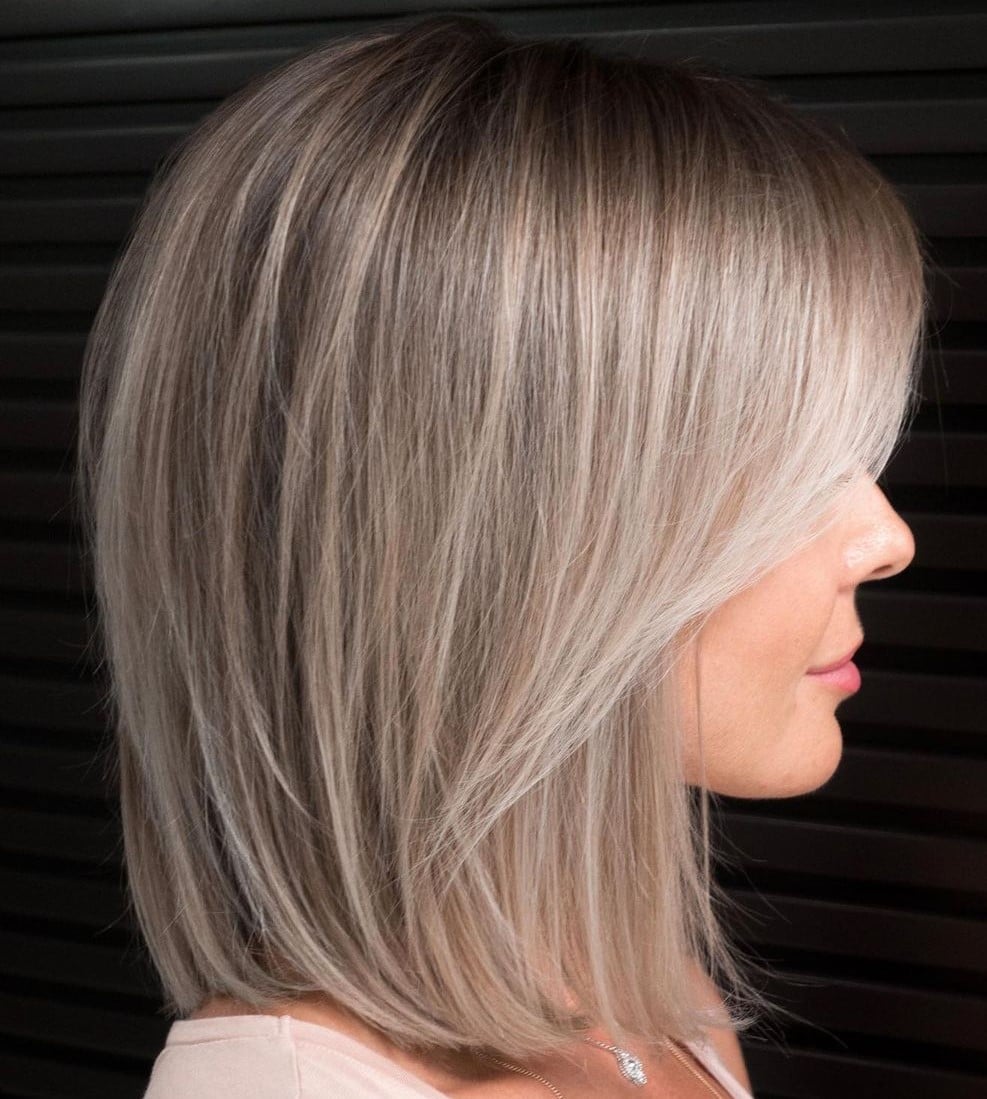 Chin Length Angled Bob With Platinum Highlights Chin Length Angled Bob With Platinum Highlights — Classy Platinum Highlights