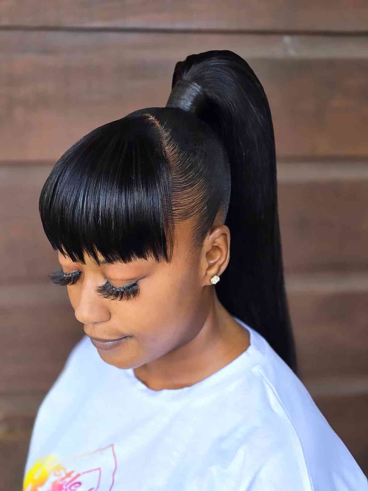 Mid-Back Sleek Ponytail With Blunt Bangs — Classy Ponytail with Bangs