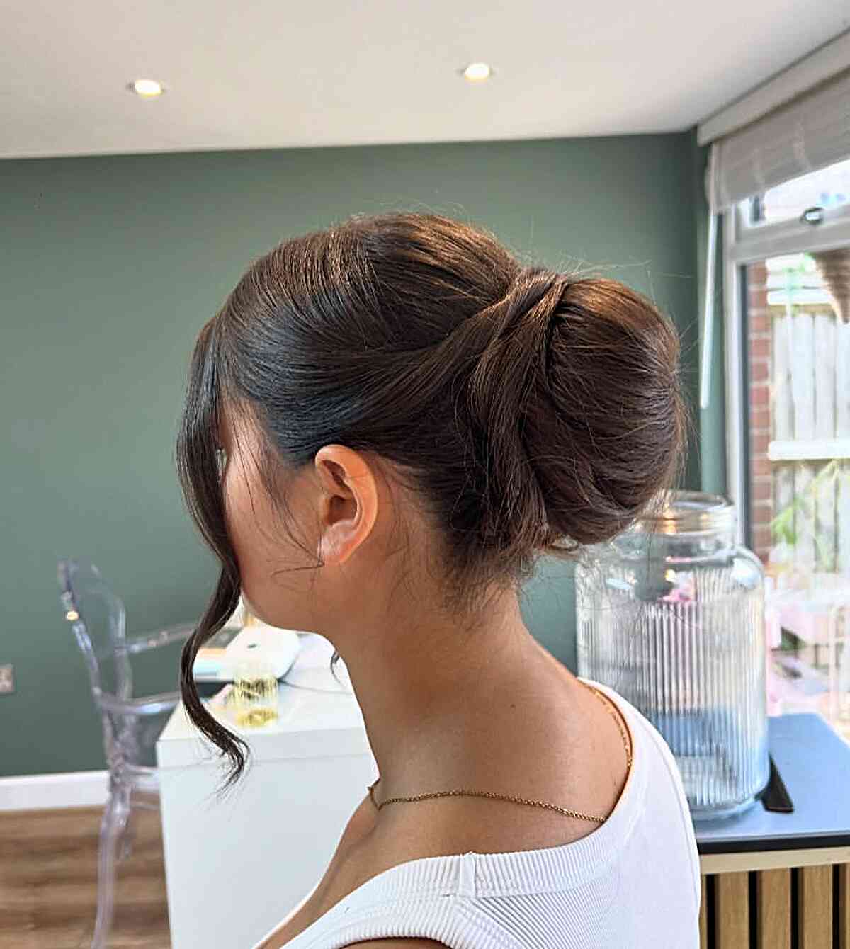 Sleek Dark Brown Collarbone Bun — Classy Rainy Days Hairstyles