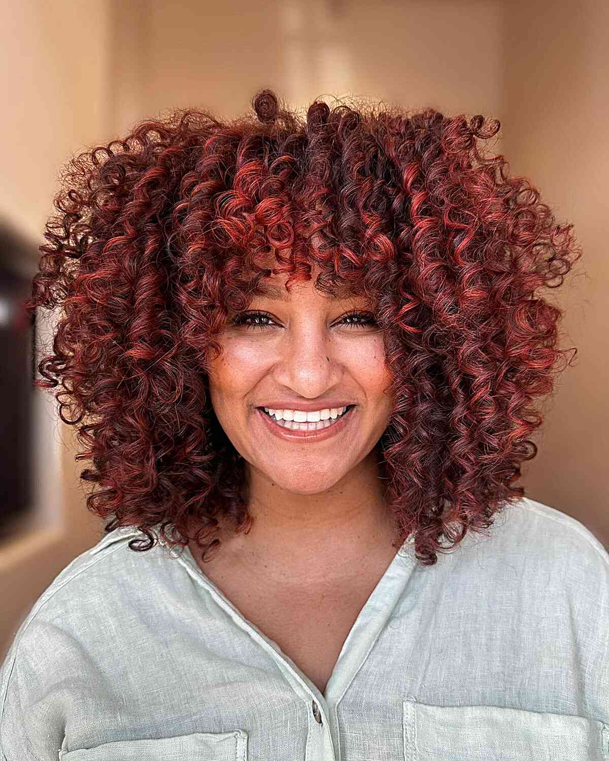 Deep Red Base With Lighter Red Highlights On Curls Deep Red Base With Lighter Red Highlights On Curls — Classy Red Balayage
