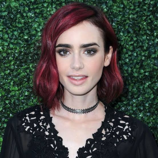 Deep Red Collarbone Bob With Soft Waves — Classy Red Hair Colors