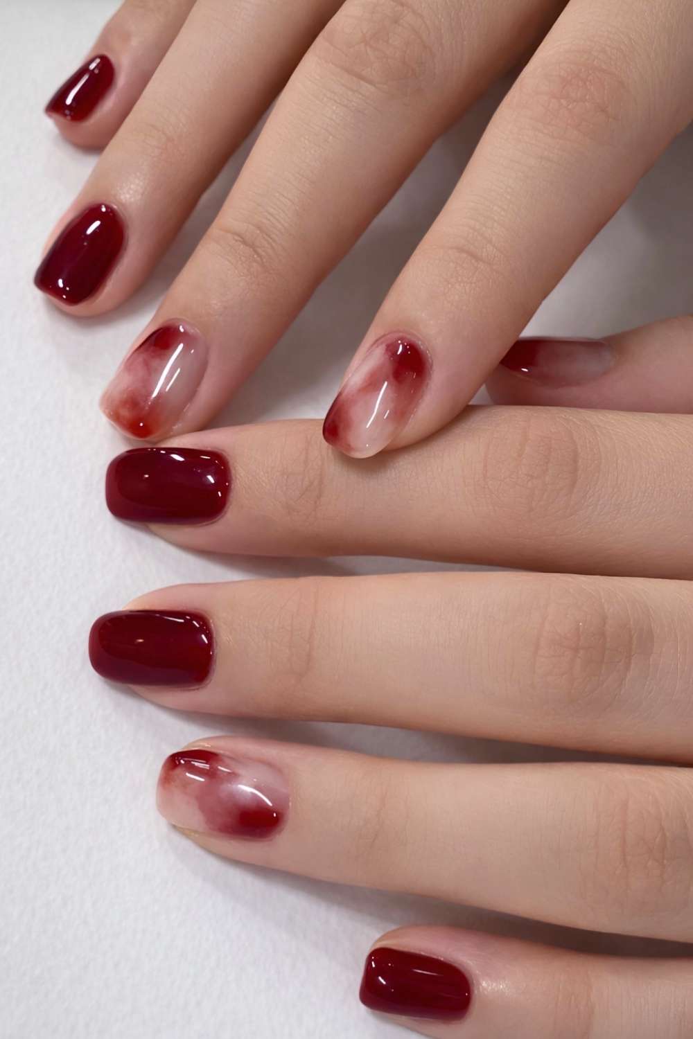 Deep Red And Nude Watercolor Almond Nails — Classy Red Nails