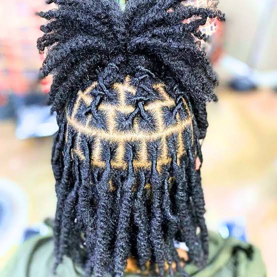 Mid-Back Wavy Locs Updo With Star Pattern Mid-Back Wavy Locs Updo With Star Pattern — Classy Retwist Locs