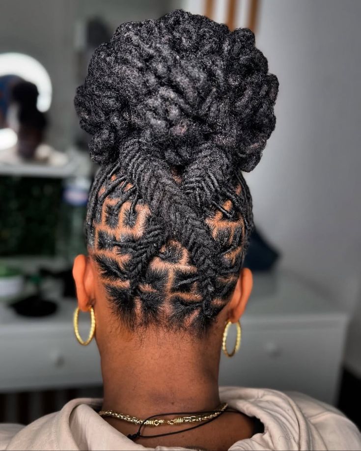 Mid-Back High Bun With Geometric Braided Sides Mid-Back High Bun With Geometric Braided Sides — Classy Retwist Locs