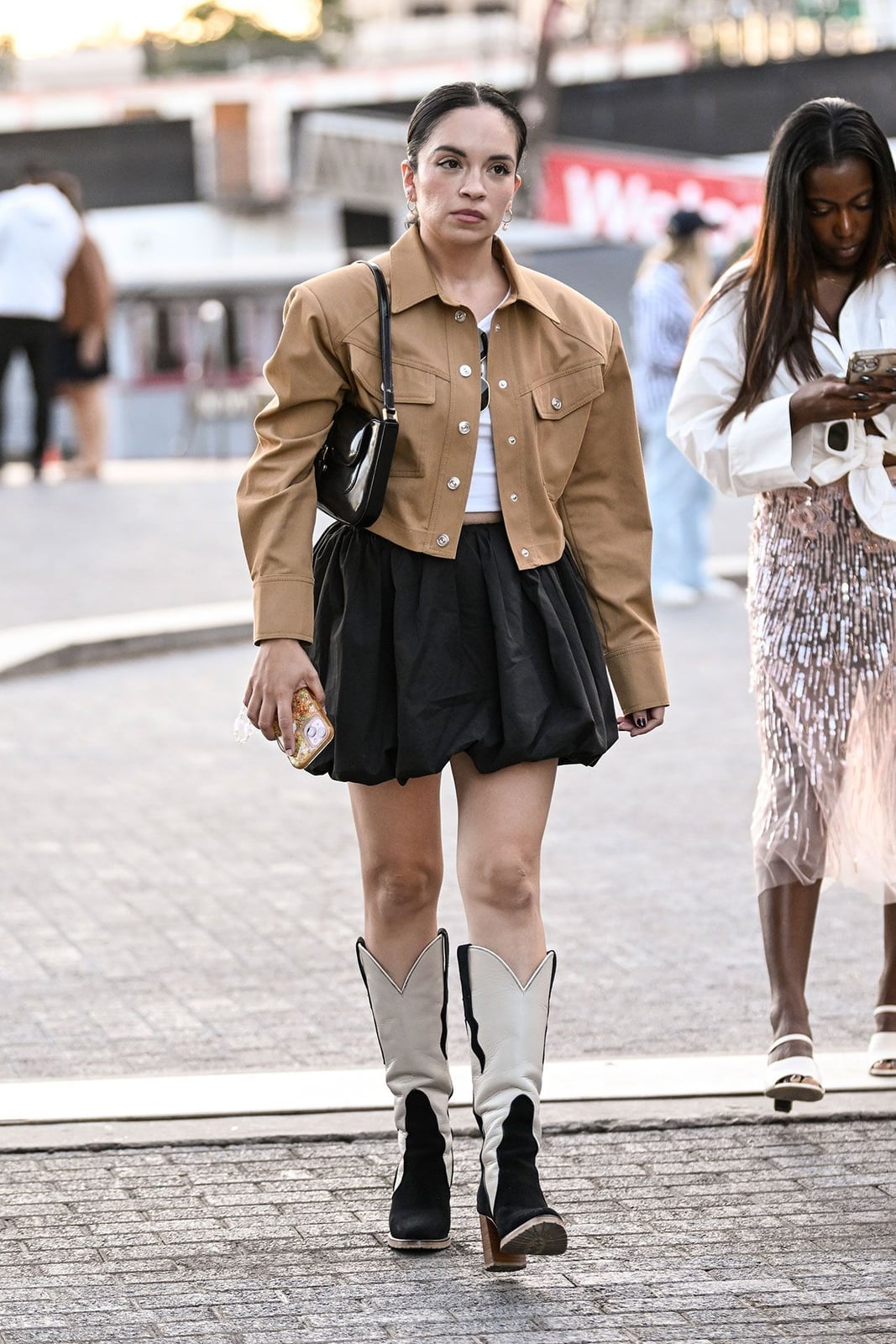 Tan Cropped Jacket Over White Tank and Voluminous Mini Skirt — Classy Rock Concert Outfits