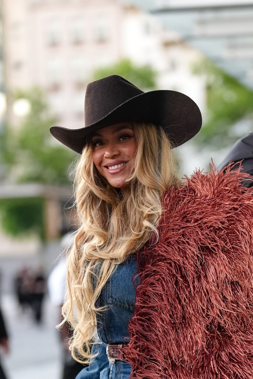 Denim Jacket Over Black Fringed Dress — Classy Rock Concert Outfits